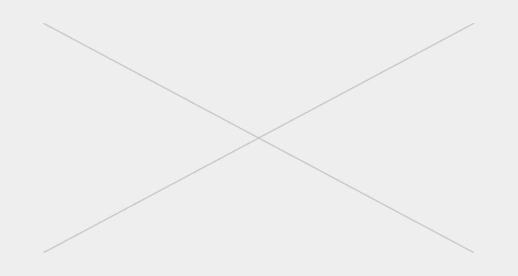 Zdjęcie przedstawia wystrój gabinetu psychologa - minimalistycznie umeblowany gabinet psychologiczny z plakatem na ścianie.